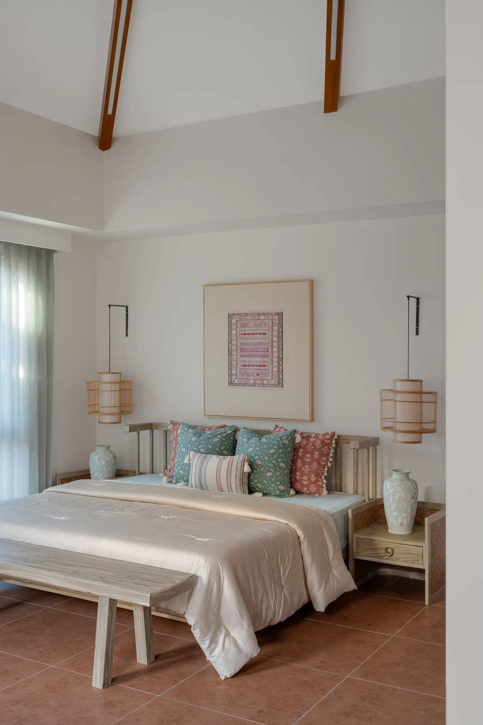 Bedroom with a vaulted ceiling