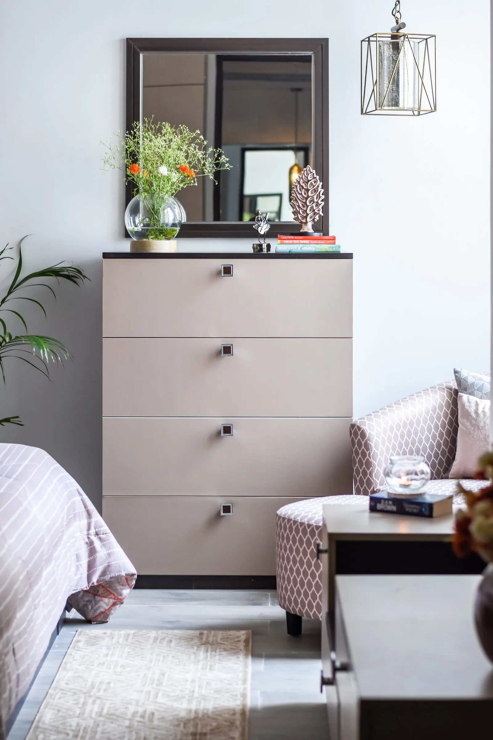 Bedroom with a tall grey chest of drawers