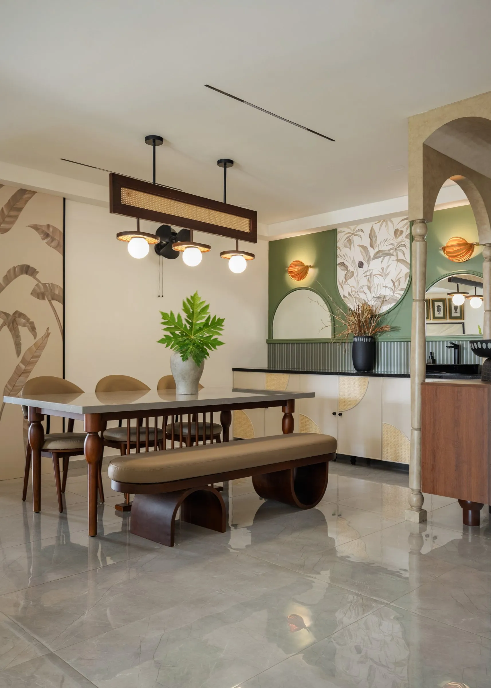 Dining room seen through an arched opening
