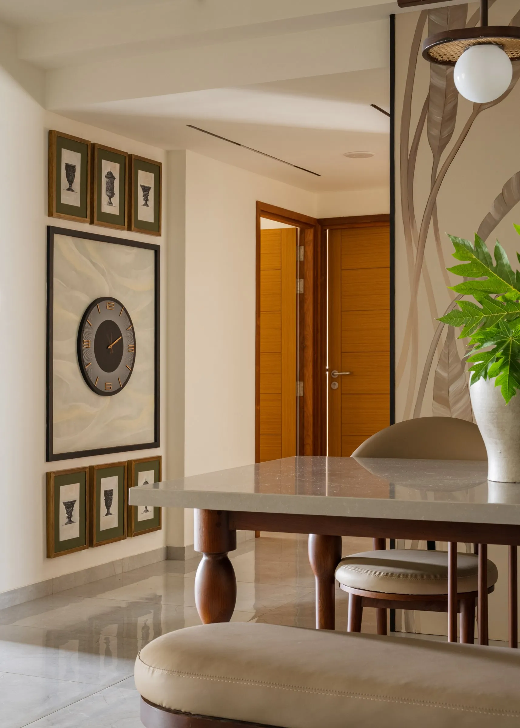 Dining corner with framed geometric artwork