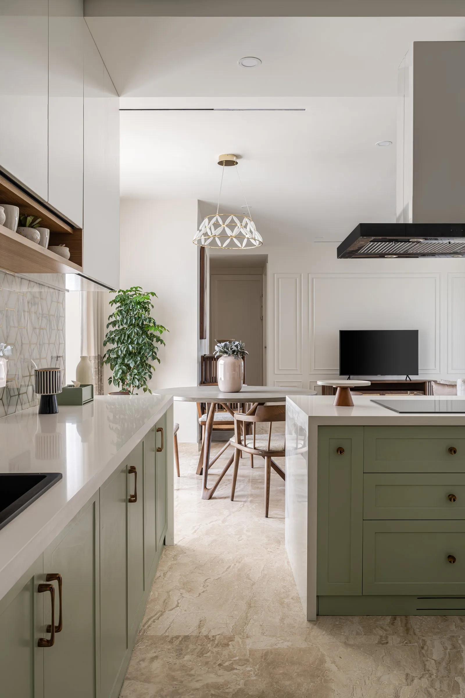 Long sage kitchen counter leading to the dining area