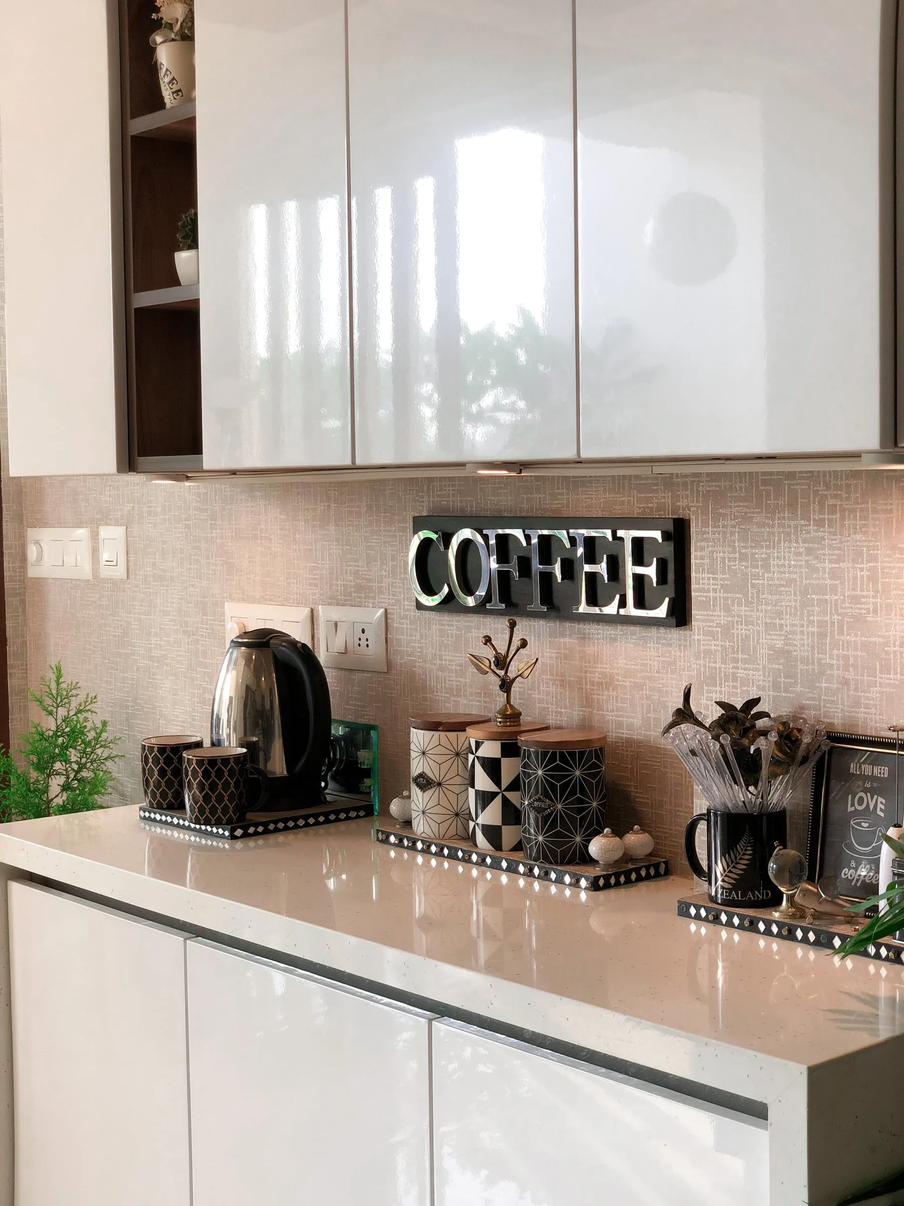 Coffee corner with a kettle and patterned mugs
