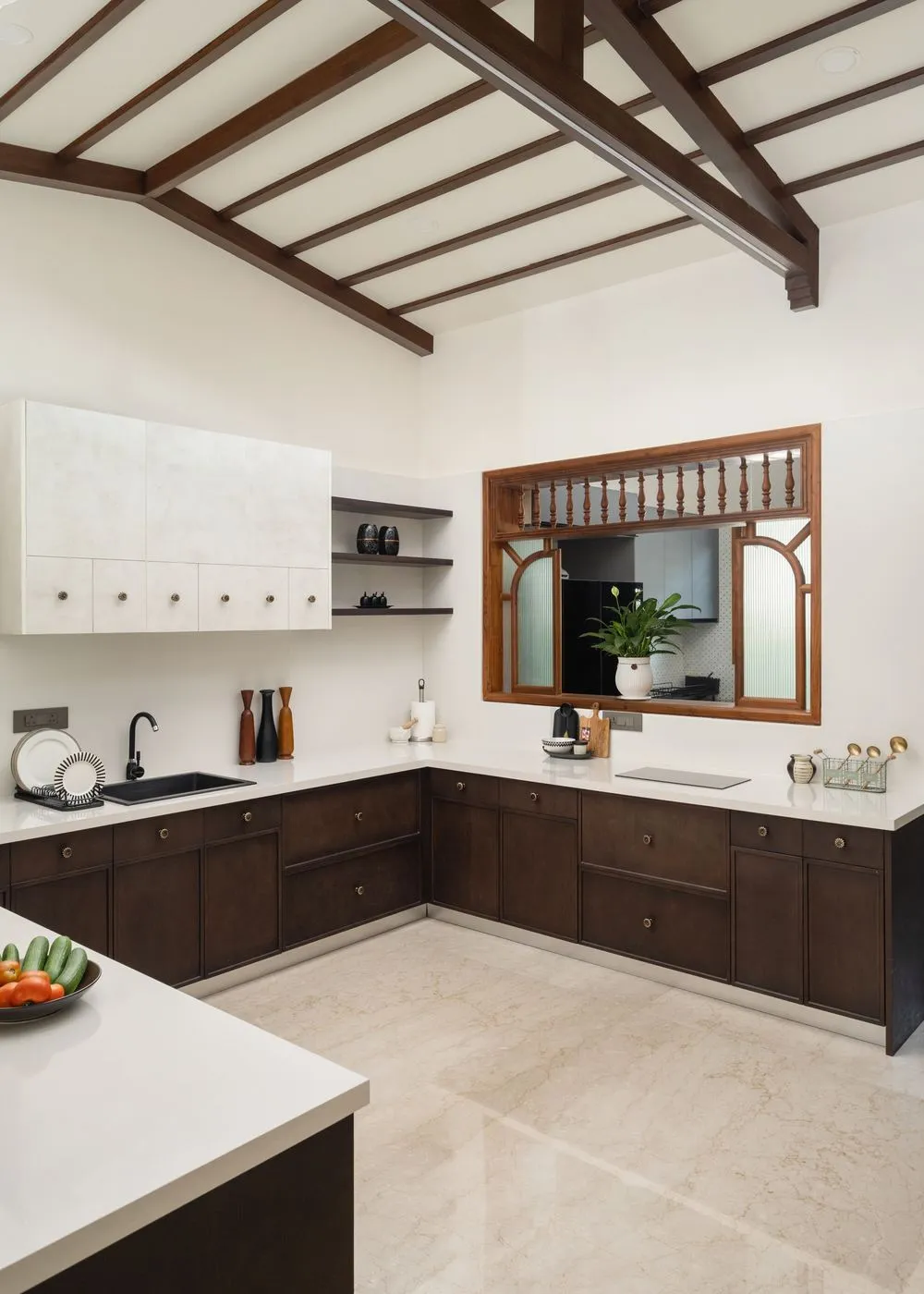 Finished kitchen with timber beams and walnut cabinets